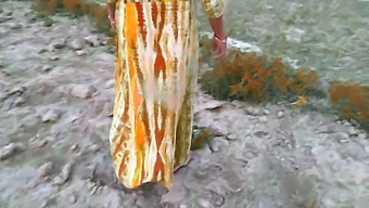 Desi Housewife And Husband Filmed Outdoor In A Rural Community